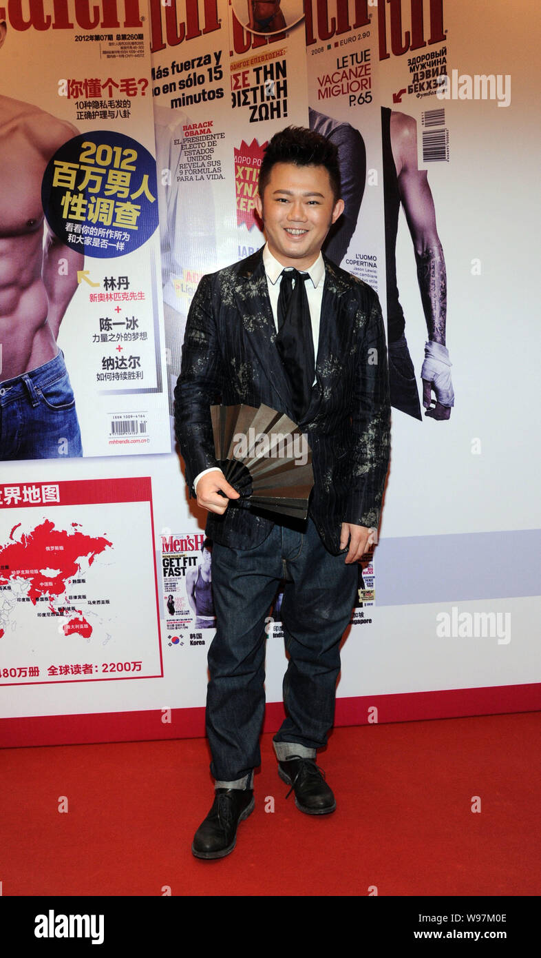 Chinese hairstylist Tony Lee poses on the red carpet as he arrives for the  final of the 4th Cool Guy contest held by Mens Health magazine in Beijing  Stock Photo - Alamy