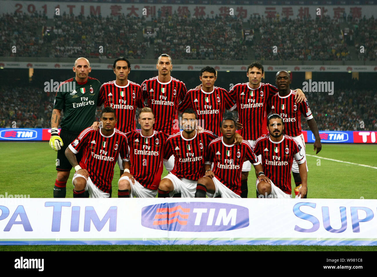 undtagelse skolde Underholde Football players of AC Milan pose for photos before the Italian Super Cup  2011 match against Inter Milan at the National Stadium, known as the Birds  N Stock Photo - Alamy