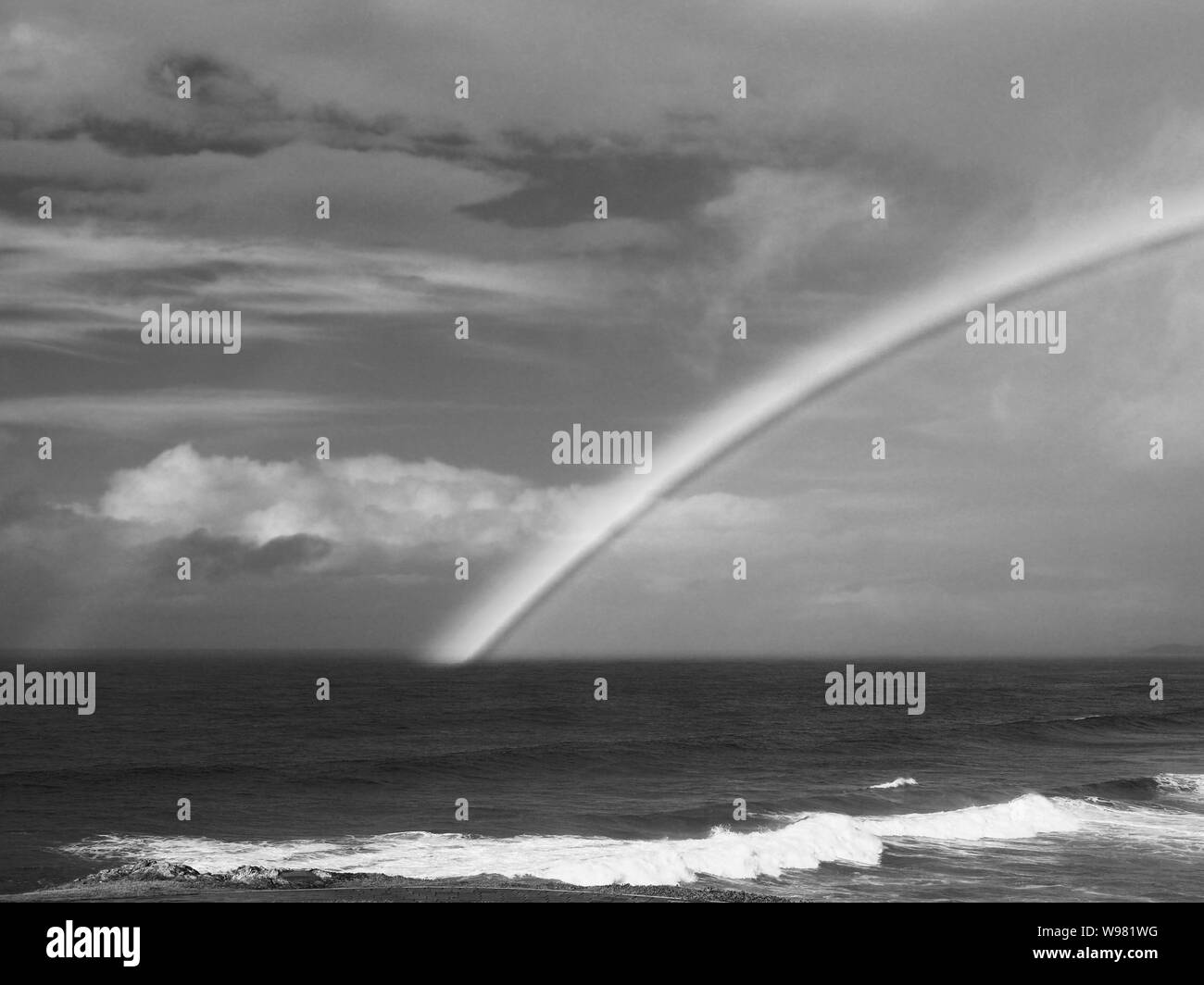 Black and white Rainbow over the ocean Stock Photo