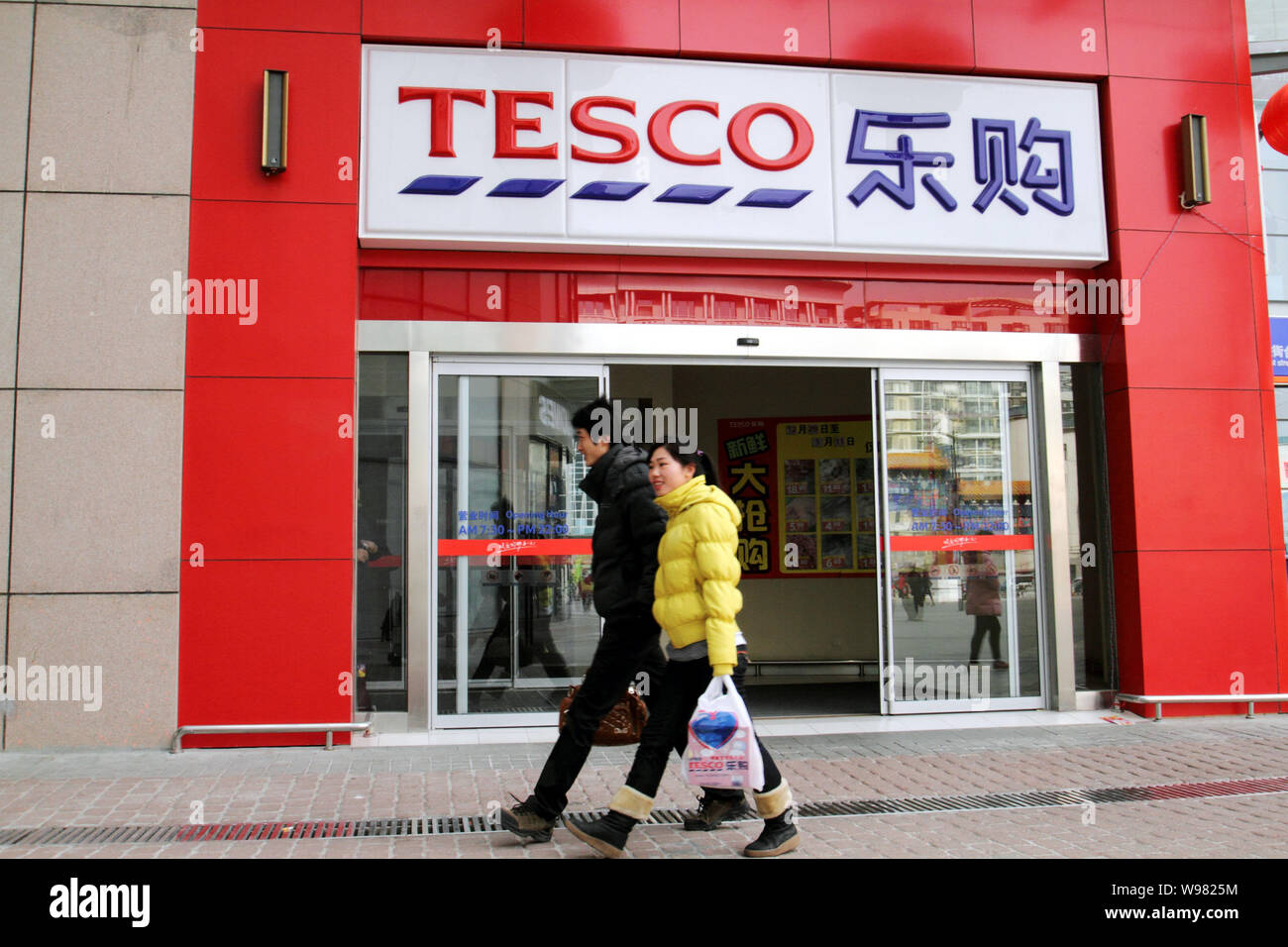 FILEChinese customers leave a Tesco hypermarket in Beijing, China