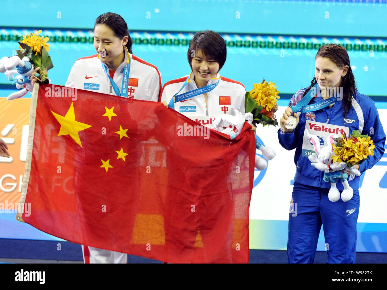 (From left) Bronze medalist Liu Zige, gold medalist Jiao Liuyang of China and silver medalist Ellen Gandy of Britain show their medals after the award Stock Photo
