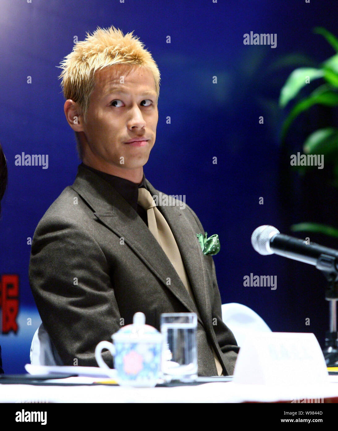 Japanese football player Keisuke Honda attends a press conference for the China-Japan Youth Football Exchange Programme in Shanghai, China, 16 Decembe Stock Photo