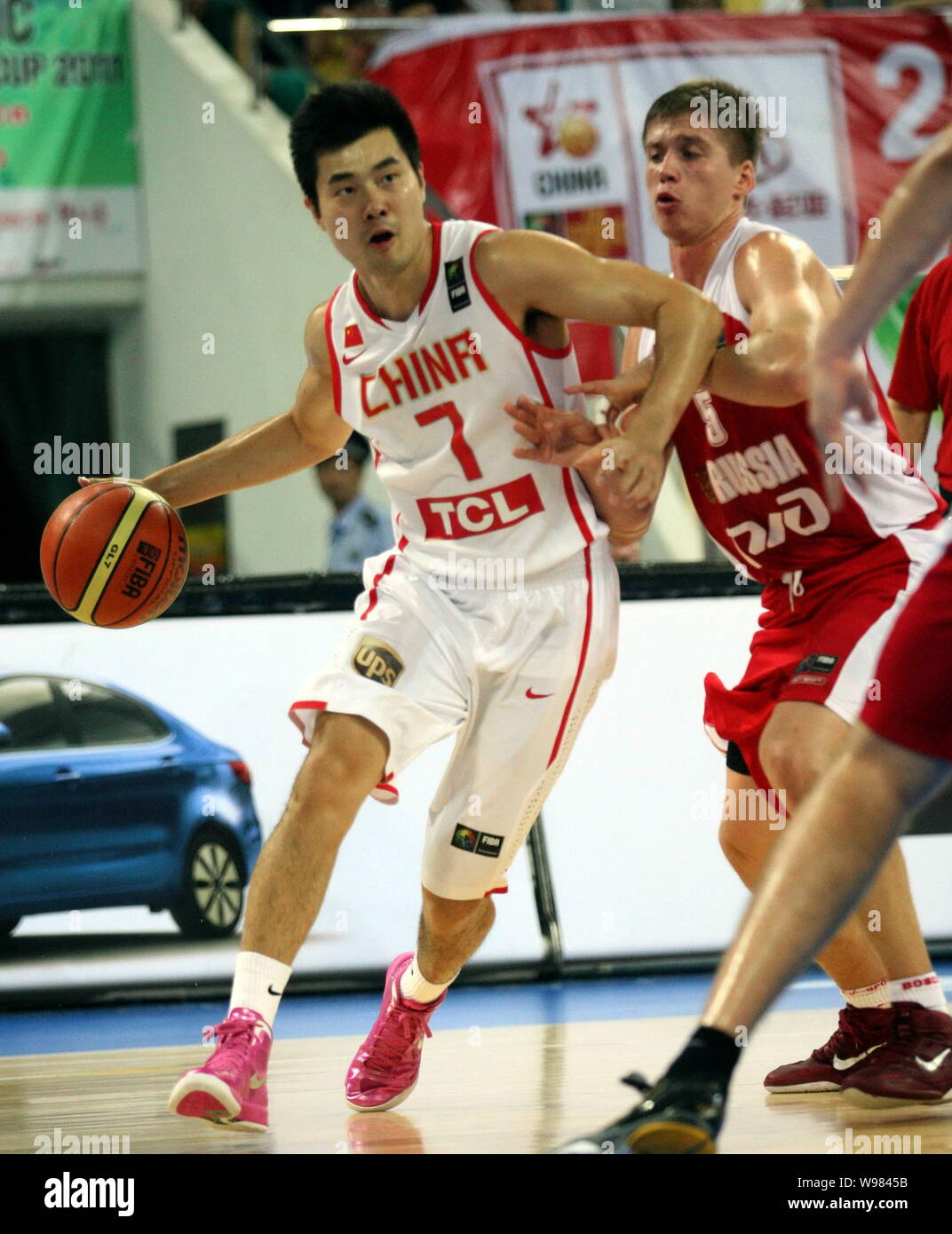 Shipeng Chinas Wang Shipeng tries to breakthrough against Russia during their ...