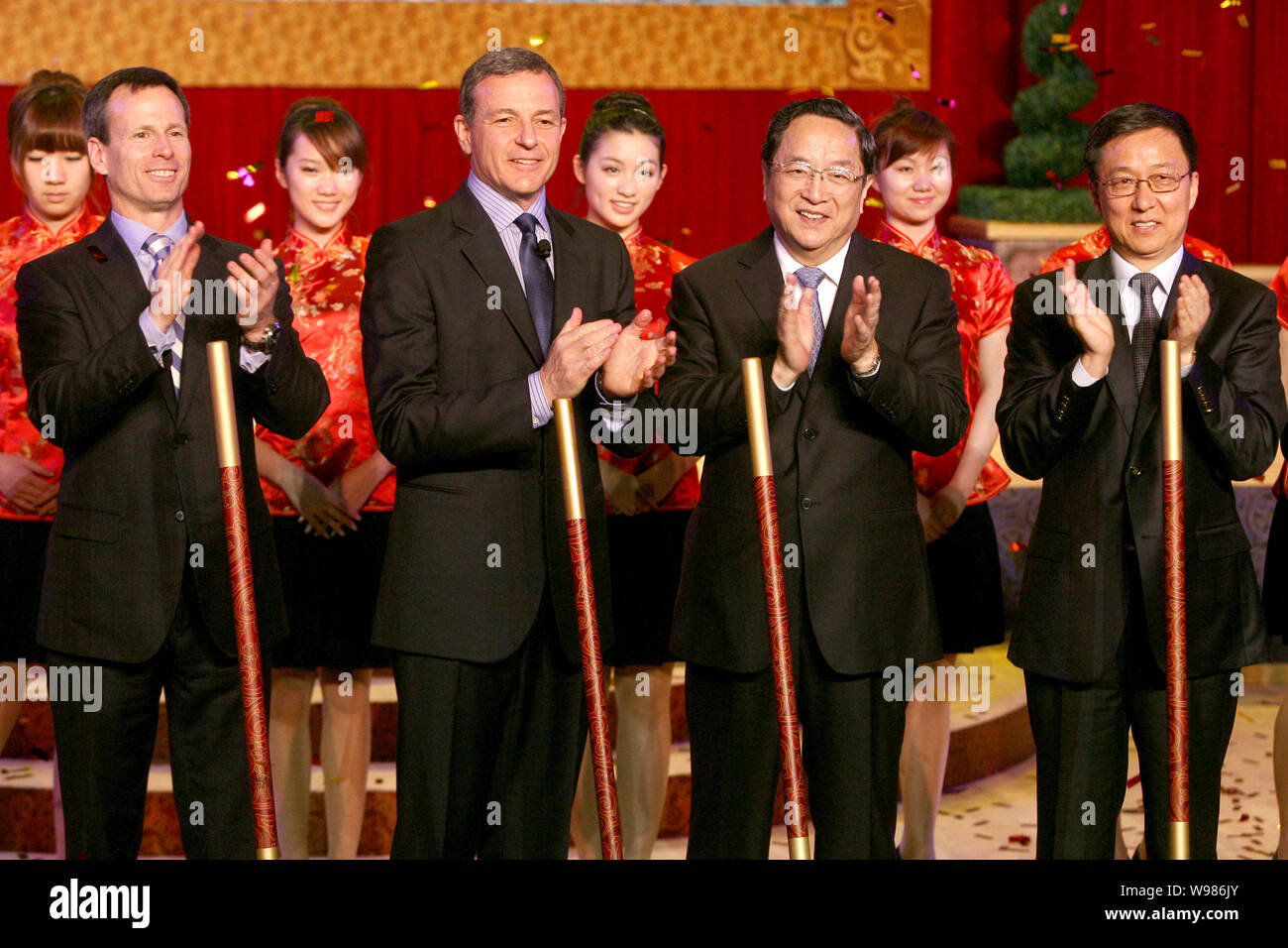 (From left) Thomas O. Staggs, Chairman of Walt Disney Parks and Resorts, Robert A. Iger (Bob Iger), President and CEO of The Walt Disney Company, Yu Z Stock Photo