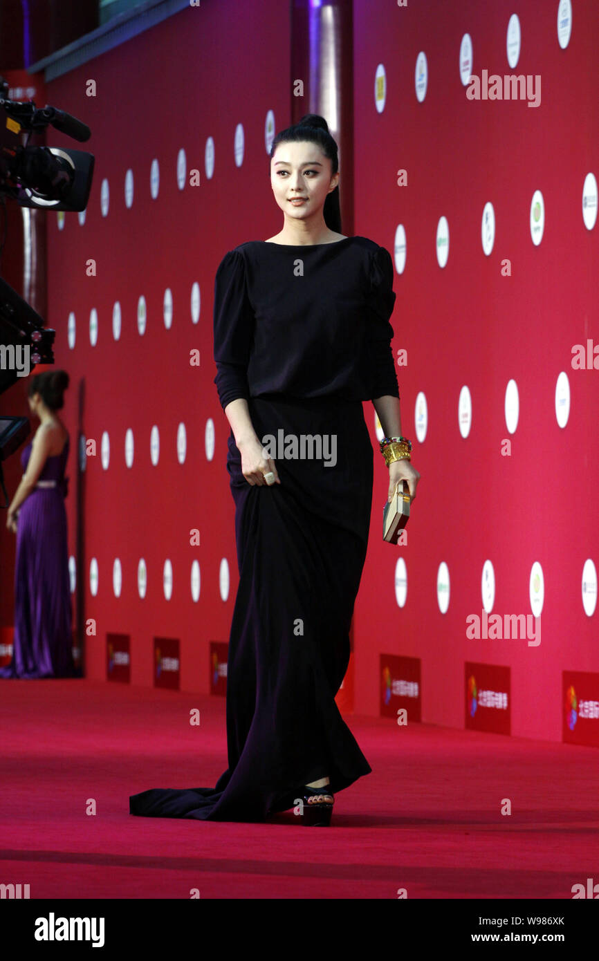 Chinese actress Fan Bingbing walks on the red carpet of Beijing International Film Festival, China, 23 April 2011. Stock Photo