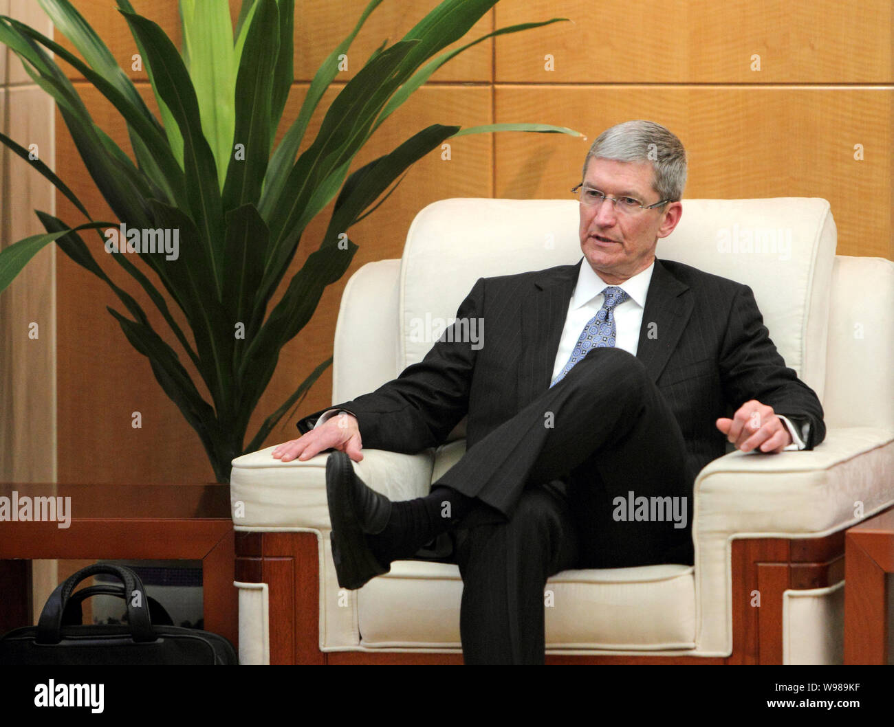 Apple COO Tim Cook is pictured during a meeting in Beijing, China, 22 June 2011.   Apple COO Tim Cook was reportedly paid a secret visit on Wednesday Stock Photo