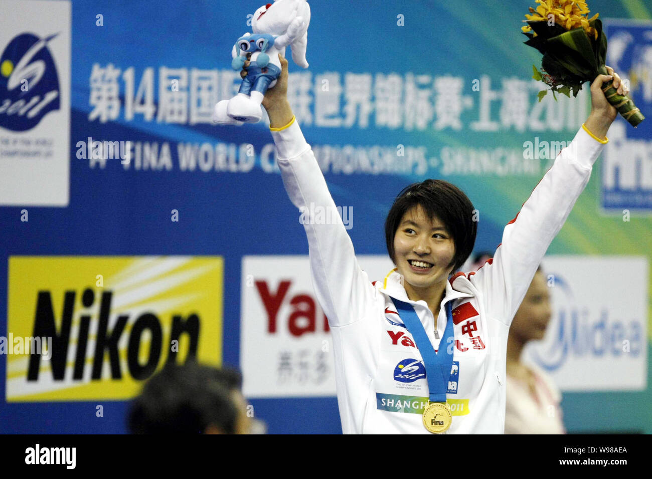 gold-medalist-jiao-liuyang-of-china-celebrates-on-the-podium-during-the