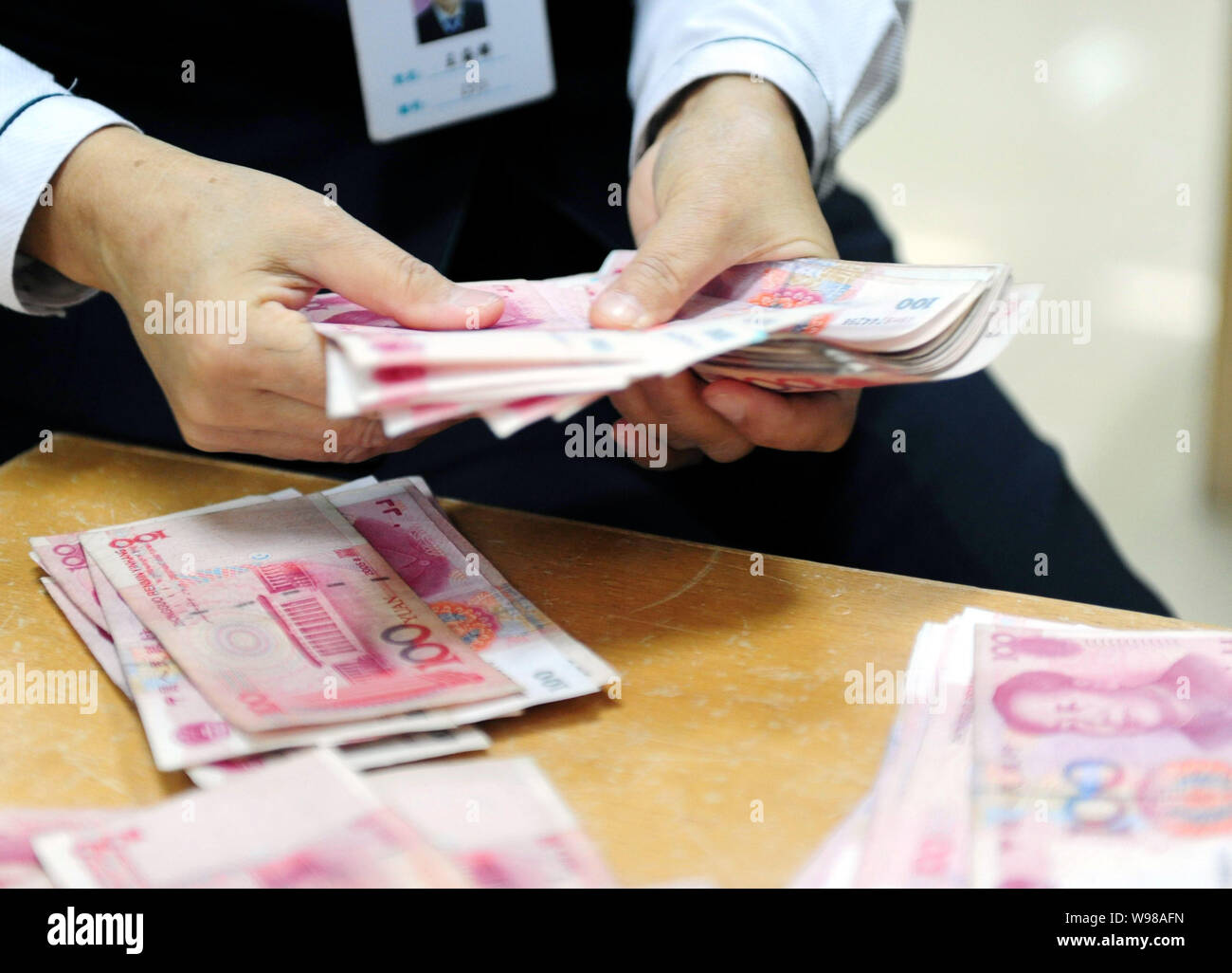 Counting Rmb Foreign exchange reserves hi-res stock photography and images - Alamy
