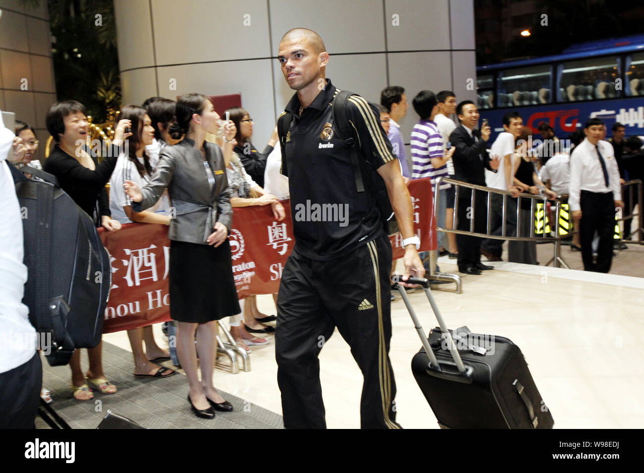 Kepler Laveran Lima Ferreira, known as Pepe, of Real Madrid arrives at the Sheraton Guangzhou Hotel in Guangzhou city, south Chinas Guangdong province Stock Photo