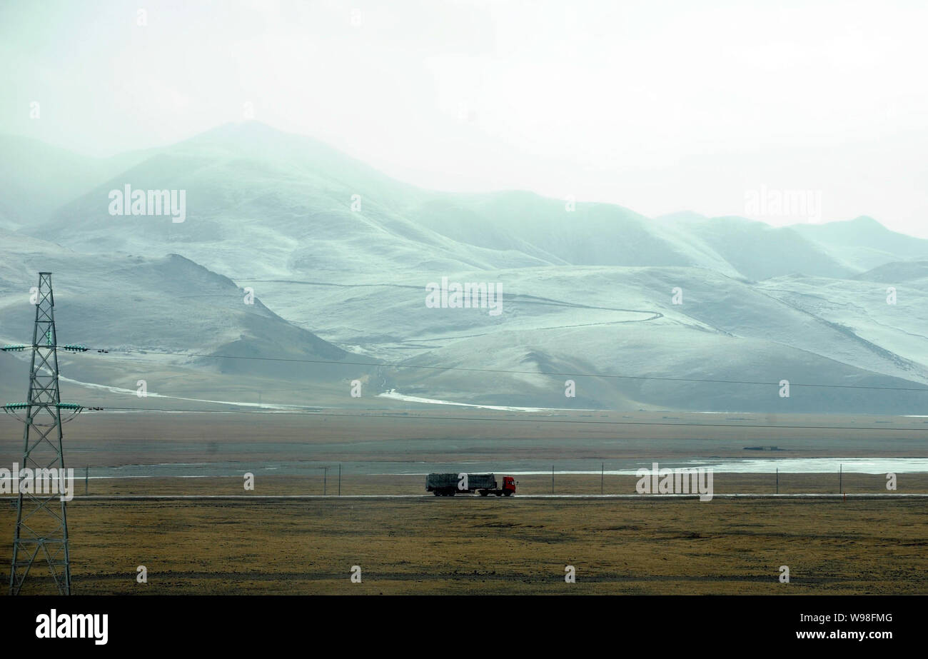 --FILE--A truck travels on a highway in Naqu, southwest Chinas Tibet Autonomous Region, 25 February 2009.   China will start work on the worlds highes Stock Photo