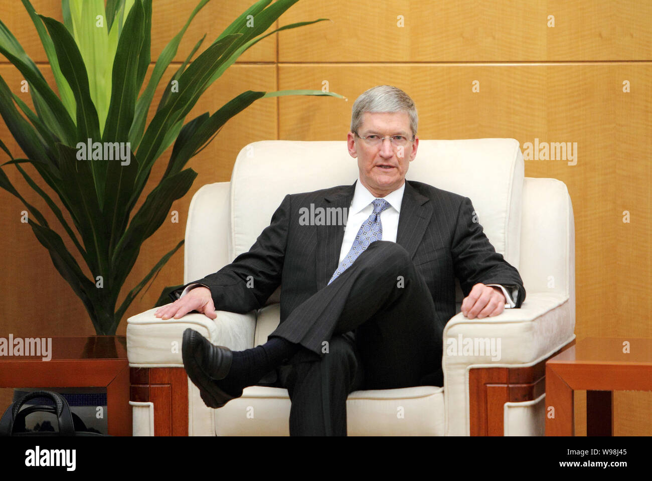 Apple COO Tim Cook is pictured during a meeting in Beijing, China, 22 June 2011.   Apple COO Tim Cook was reportedly paid a secret visit on Wednesday Stock Photo