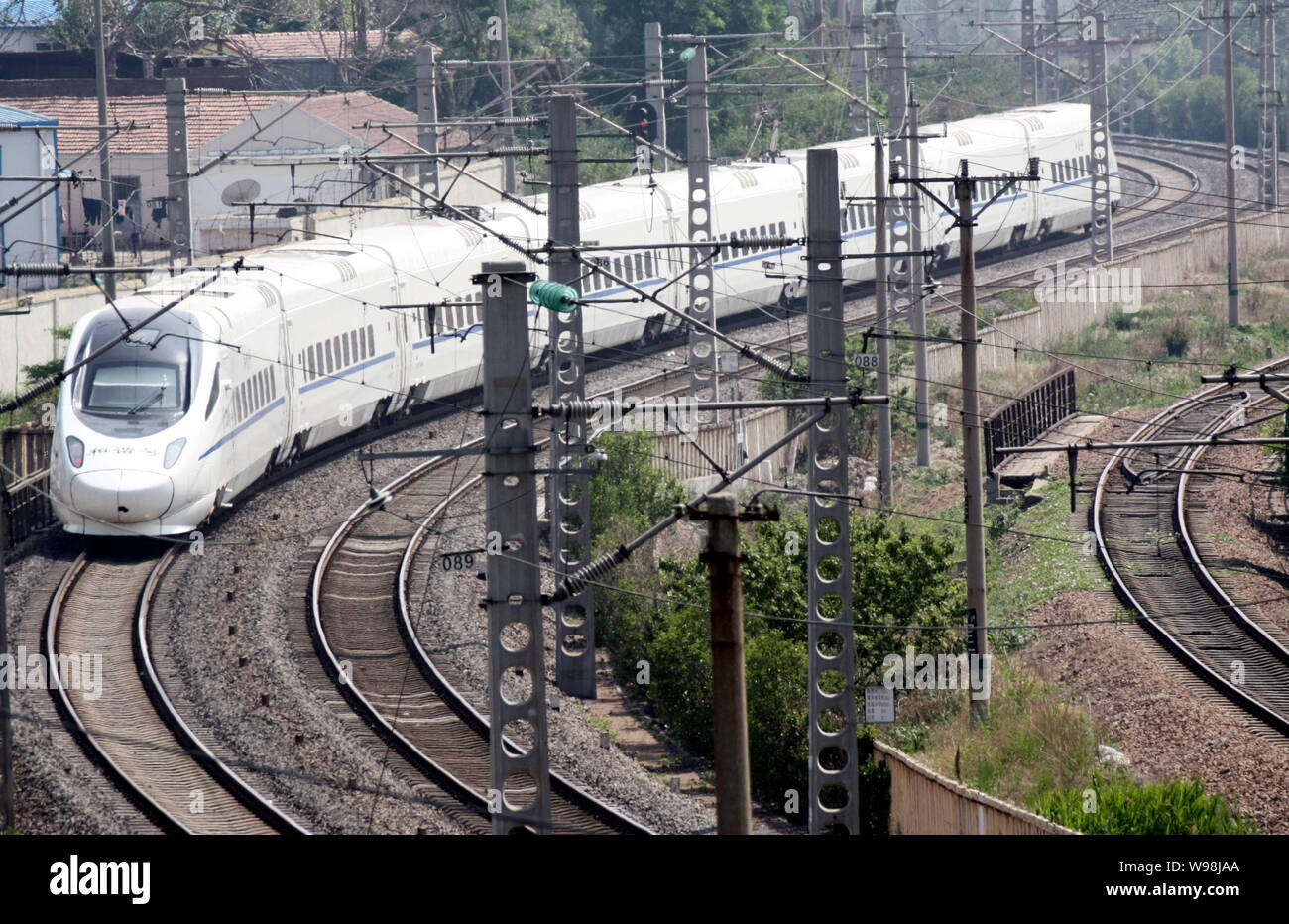 --FILE--A CRH (China Railway High-speed) train travels in Qingdao city, east Chinas Shandong province, 15 June 2011.   The deadly July 23 train crash Stock Photo