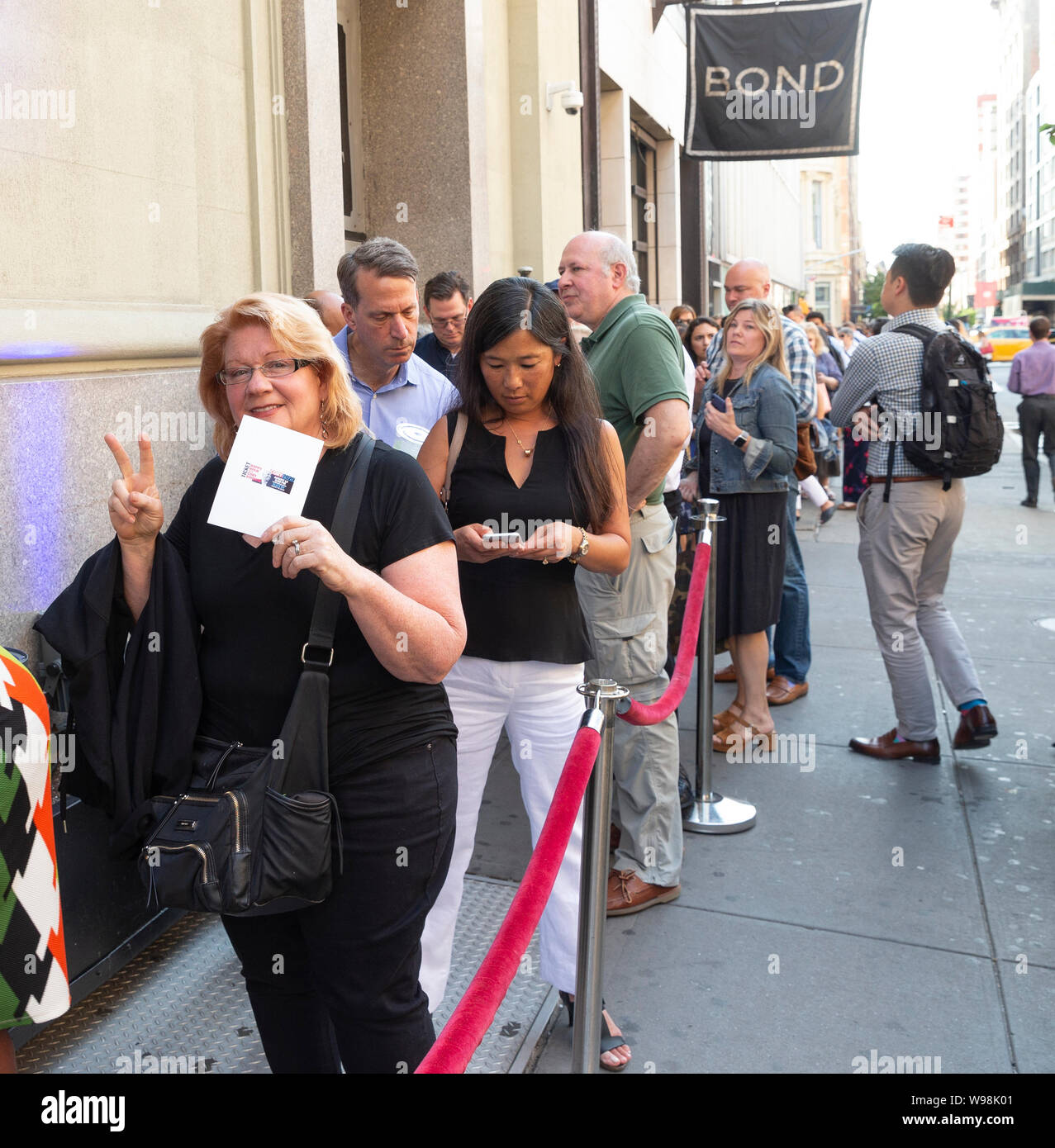 New York, NY - August 12, 2019: People lined up for Democratic presidential candidate US Senator Cory Booker campaign grassroots Happy Hour fundraiser event at the nightclub Slate Stock Photo