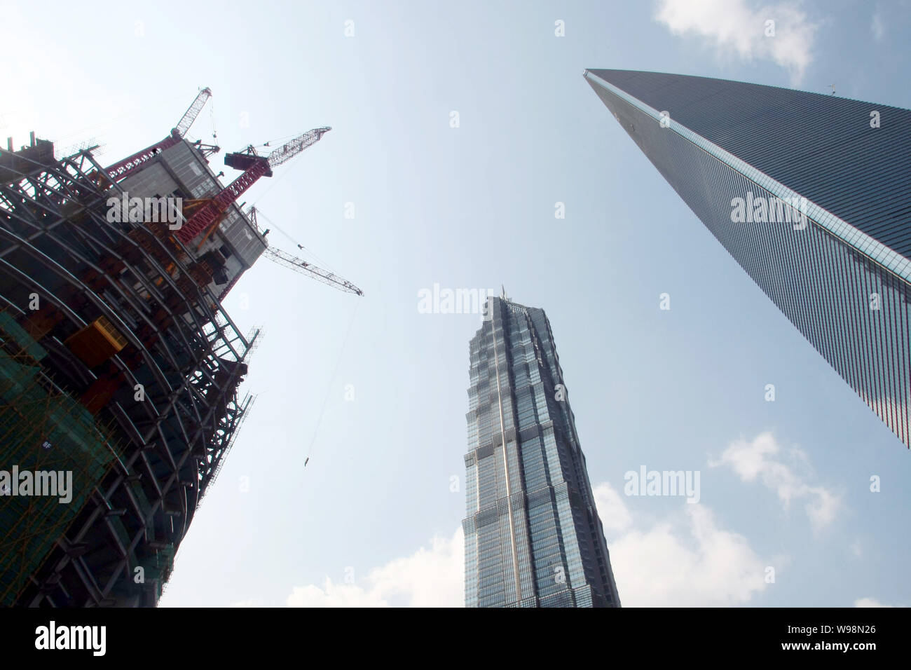 The Shanghai Tower is under construction next to the The Shanghai Tower is under construction next to the
