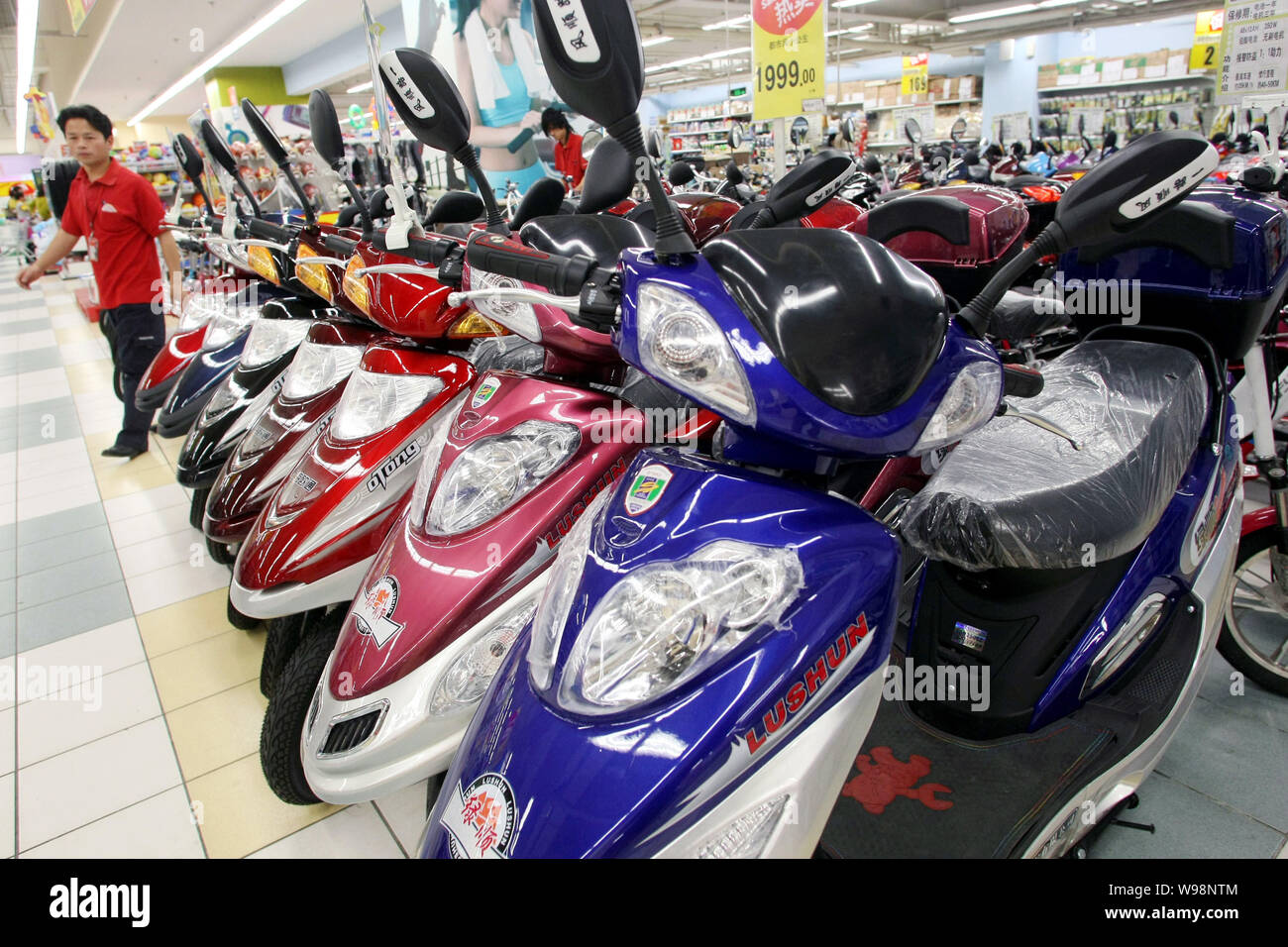 Electric bikes are for sale at a supermarket in Shanghai, China, 30 May 2011.   Many of the mainlands army of battery-powered-bicycle riders will have Stock Photo