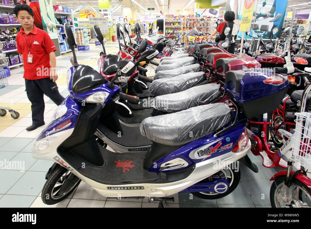 Electric bikes are for sale at a supermarket in Shanghai, China, 30 May 2011.   Many of the mainlands army of battery-powered-bicycle riders will have Stock Photo
