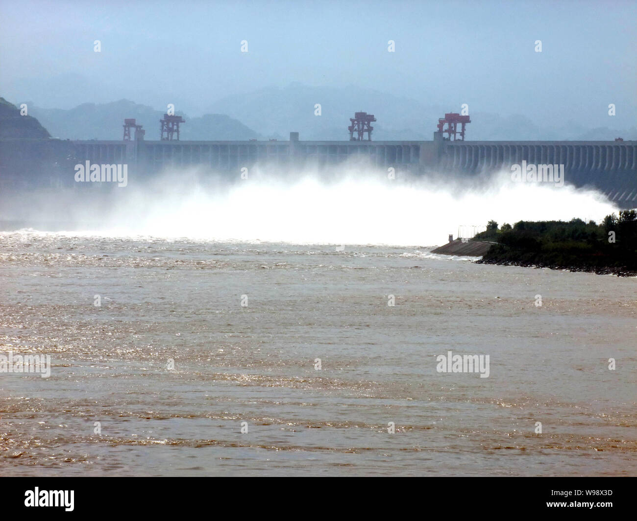 FILE--Floodwaters gush out of the Three Gorges Dam during a flood discharge  operation in Yichang city, central Chinas Hubei province, 11 September 2  Stock Photo - Alamy