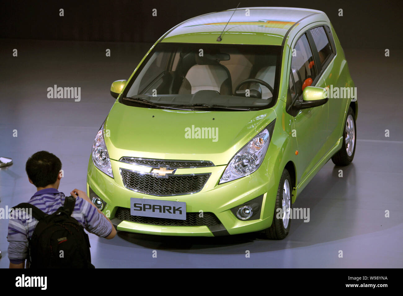 --File-- A Chevrolet Spark of Shanghai GM is seen on display during an auto show in Guangzhou city, south Chinas Guangdong Province, December 20, 2010 Stock Photo