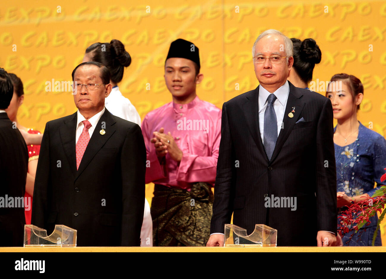 Malaysian Prime Minister Najib Tun Razak, front right, and Burmese Vice President Tin Aung Myint Oo, front left, attend the opening ceremony of the 8t Stock Photo