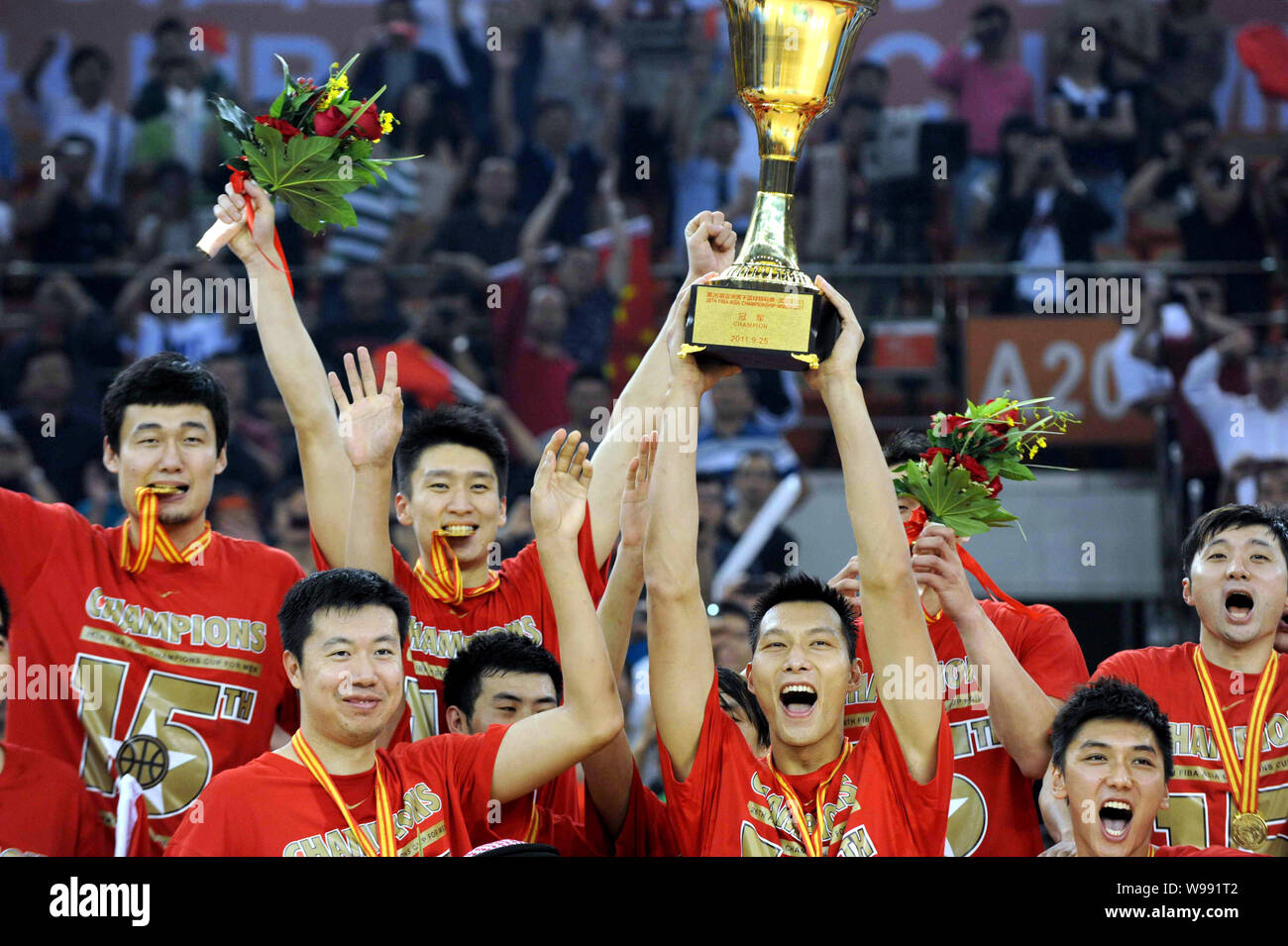 Basketball players of China celebrate during the award ceremony after  defeating Jordan in their final match during the 26th FIBA Asia Championship  in Stock Photo - Alamy