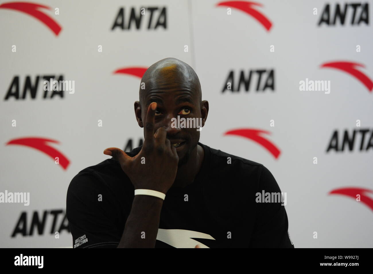 NBA star of Boston Celtics Kevin Garnett  is interviewed during his China Tour in Wuhan, central Chinas Hubei province, 17 August 2011. Stock Photo