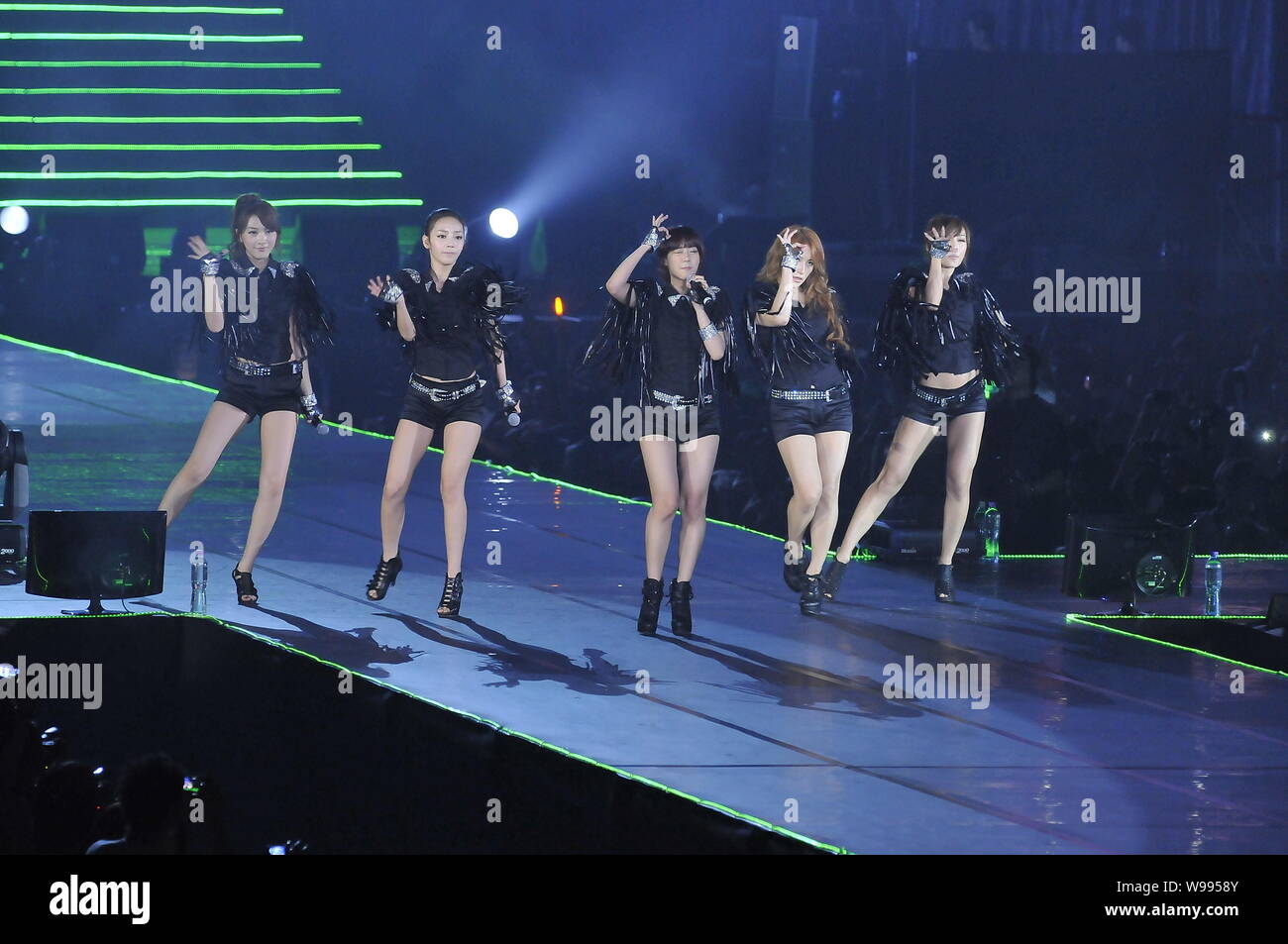 Members of Kara, a South Korean girl group signed with DSP Media (DSP), perform at the K-pop Girls in Love Live in HK concert in Hong Kong, China, 23 Stock Photo