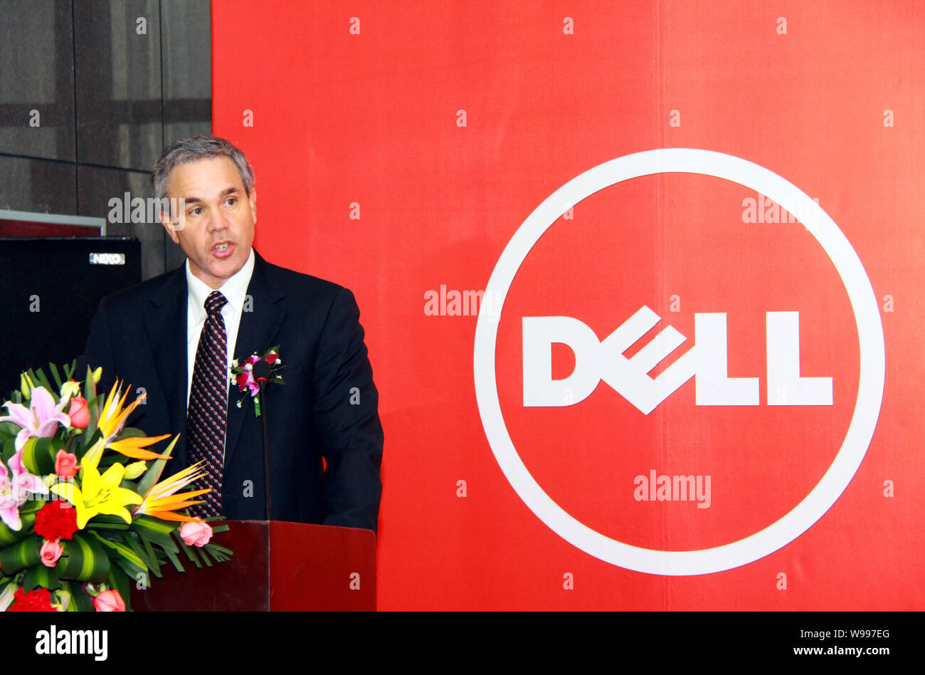 Stephen Felice, Senior Vice President of Dell and President of Consumer, Small and Medium Business of Dell, speaks at the opening ceremony for the Del Stock Photo