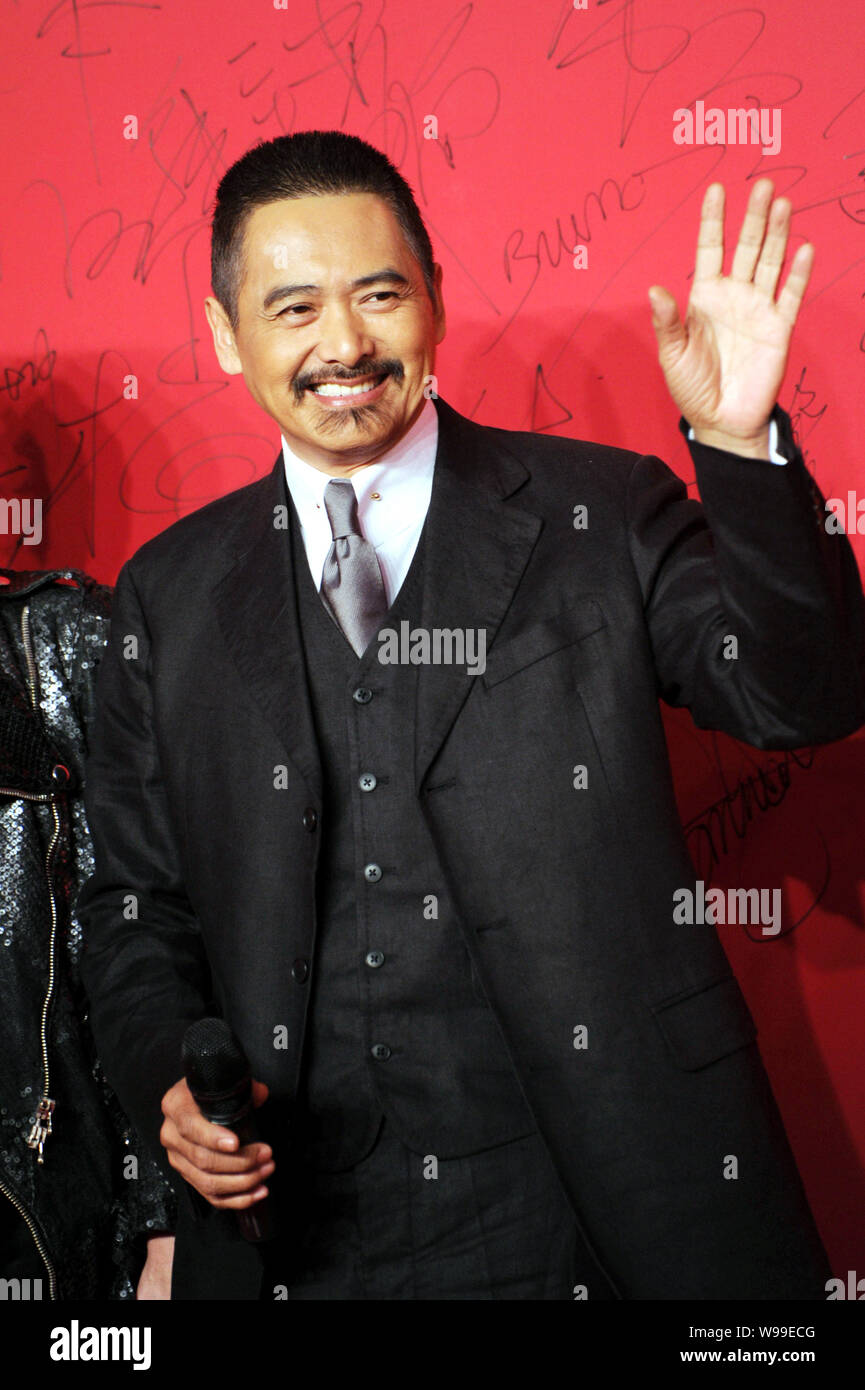 Hong Kong actor Chow YunFat attends the premiere of the film, Let The Bullets Fly, in Beijing