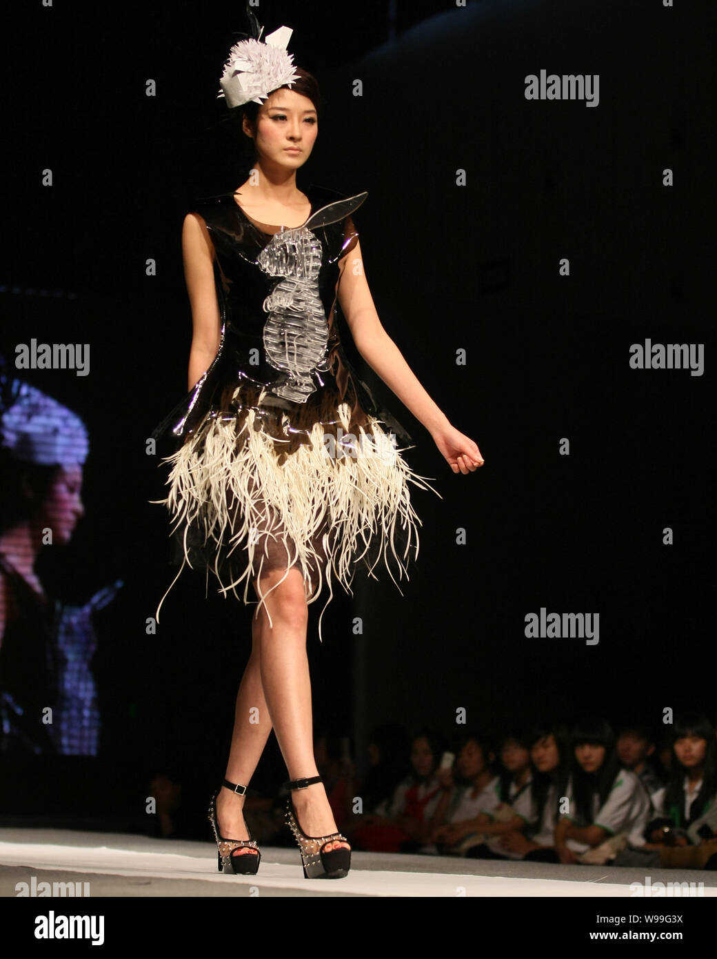 A model wearing distinctive garment poses on the stage during 2011 Jiangsu  Creative Fashion Week in Nanjing, east Chinas Jiangsu province, 8 September  Stock Photo - Alamy