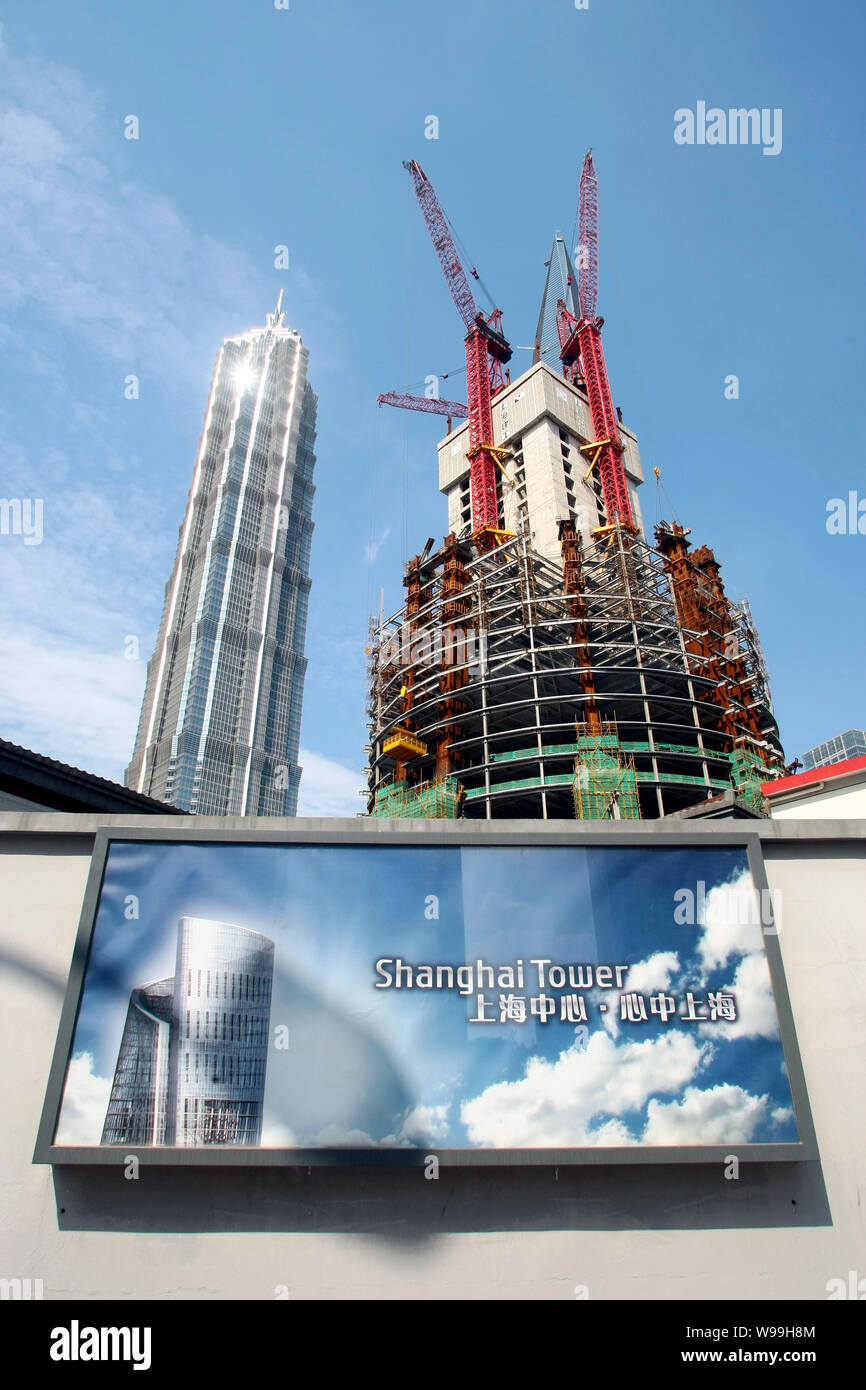 The Shanghai Tower, right, is under construction next to Jinmao Tower ...