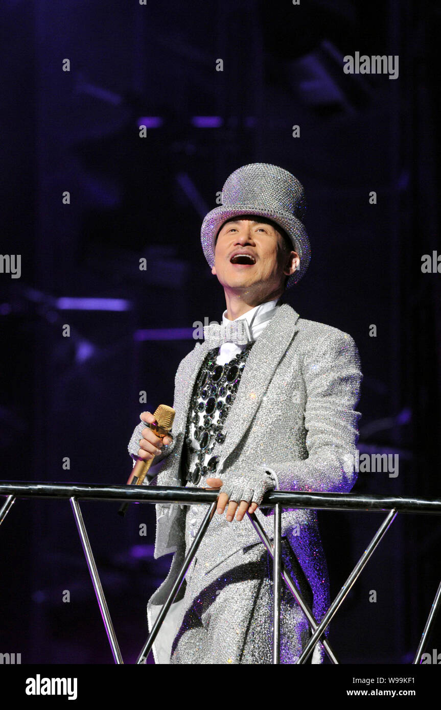 Hong Kong singer Jacky Cheung performs at his concert in Guangzhou city, south Chinas Guangdong Province, January 13, 2011. Stock Photo