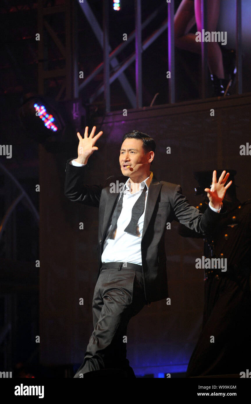 Hong Kong singer Jacky Cheung performs at his concert in Guangzhou city, south Chinas Guangdong Province, January 13, 2011. Stock Photo