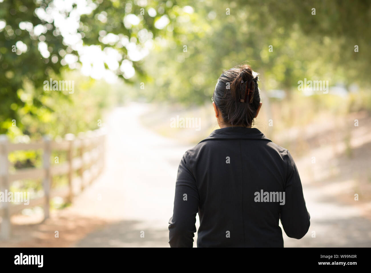 Portrait of a fit Asian woman exercising. Stock Photo
