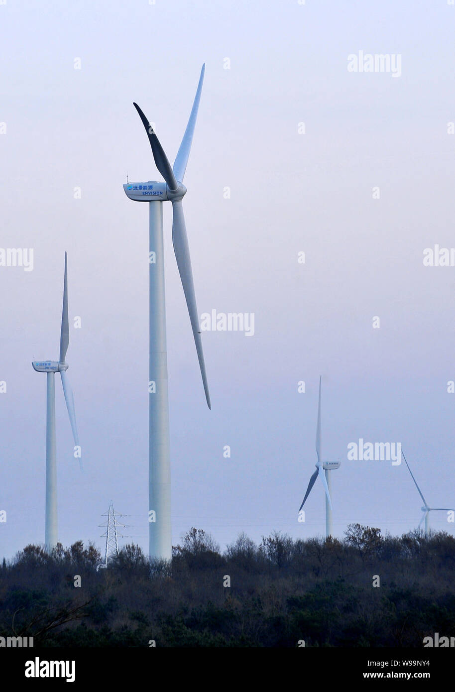 --FILE--Wind turbines generate electricity at a wind farm in Chuzhou city, east Chinas Anhui province, 28 December 2010.   China has the worlds highes Stock Photo