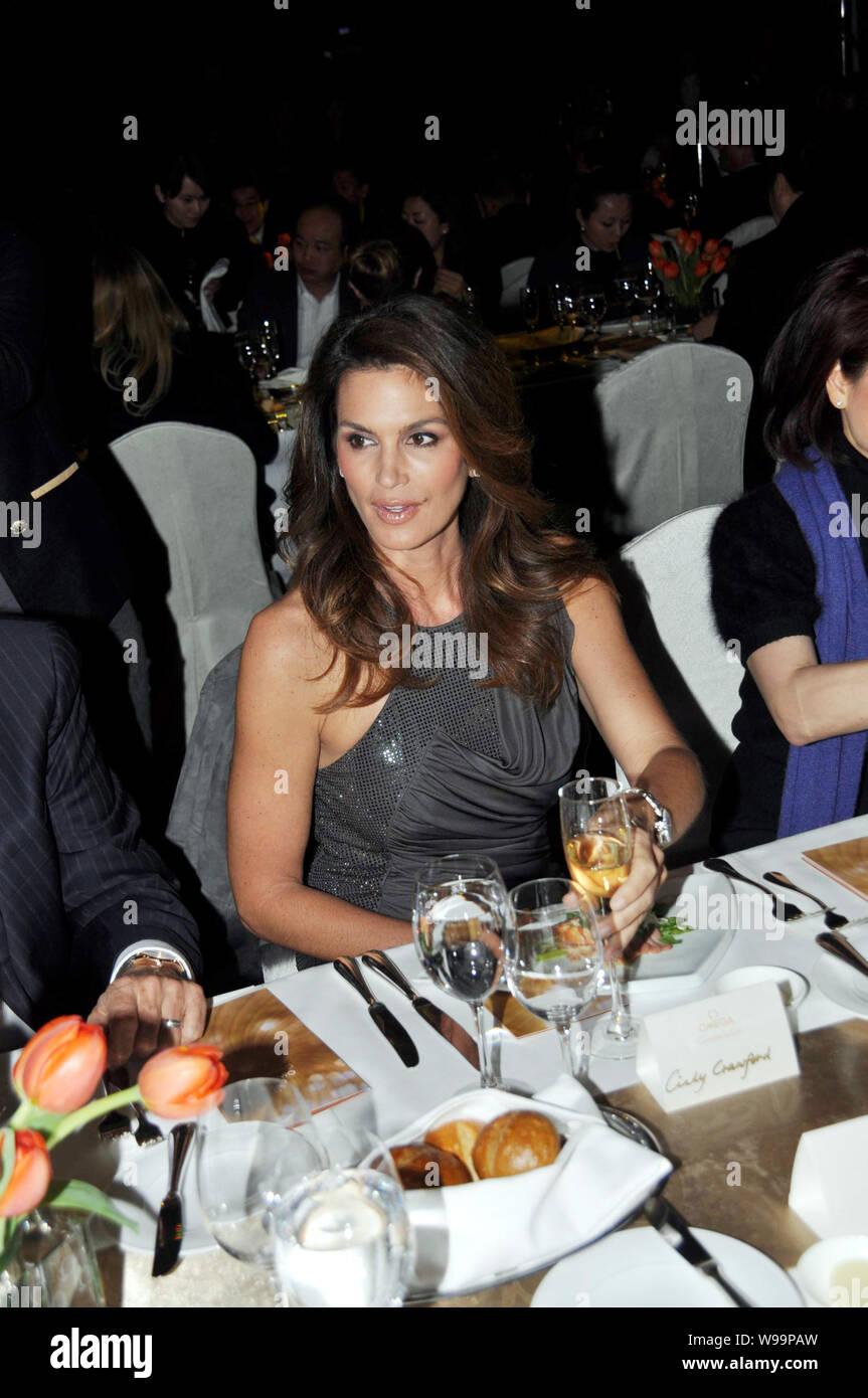 Former U.S. supermodel Cindy Crawford attends a banquet held by Omega in Shanghai, China, 3 March 2011. Stock Photo