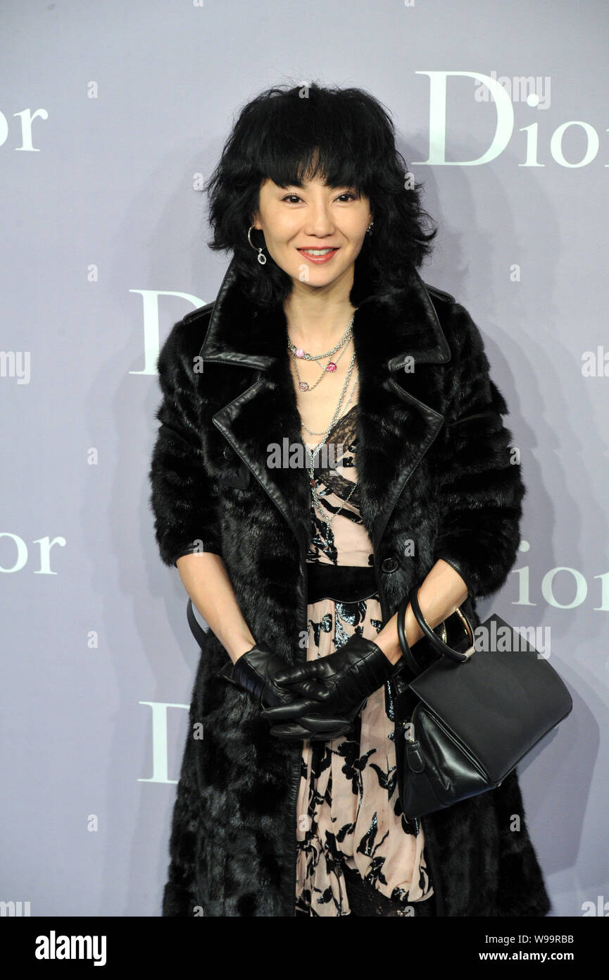 From L) Chairman and CEO of LVMH Bernard Arnault, Hong Kong actress Maggie  Cheung and Dior CEO Sidney Toledano are seen during the opening ceremony o  Stock Photo - Alamy