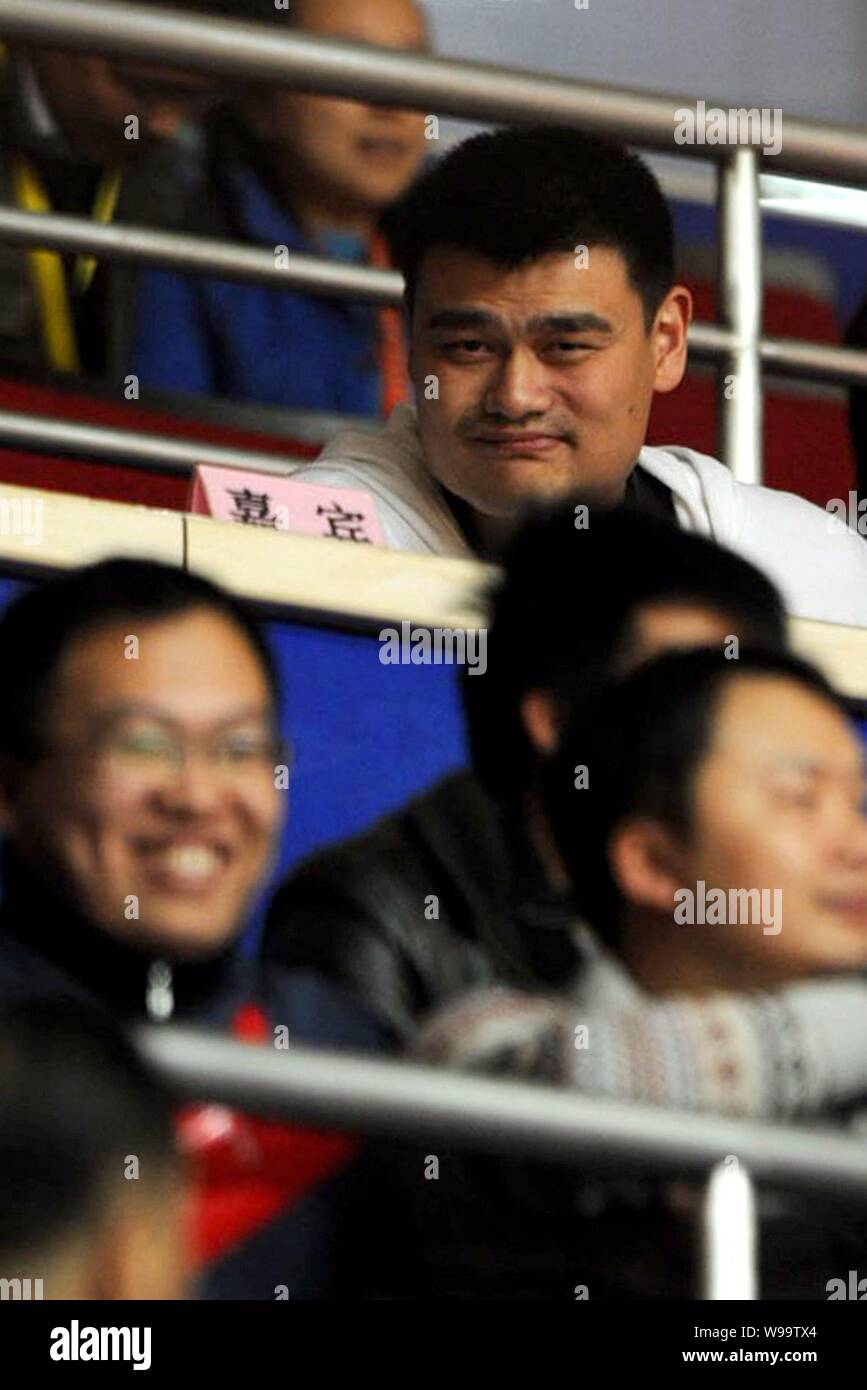 Retired Chinese basketball player Yao Ming is pictured during a CBA game between Shanghai Sharks and Xinjiang Flying Tigers in Shanghai, China, 14 Dec Stock Photo