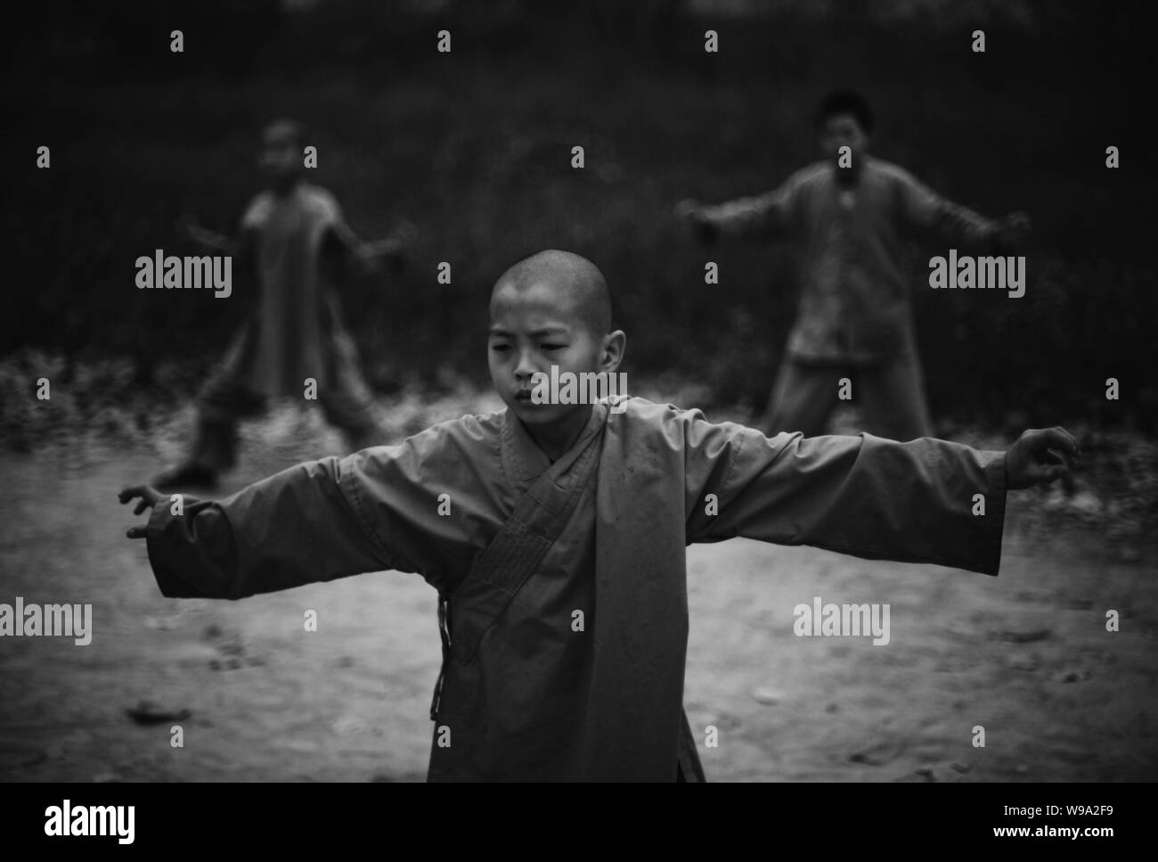 Little boys from the Shaolin Kungfu Training Base practise kungfu at the Shaolin Temple in Dengfeng city, central Chinas Henan province, 30 October 20 Stock Photo
