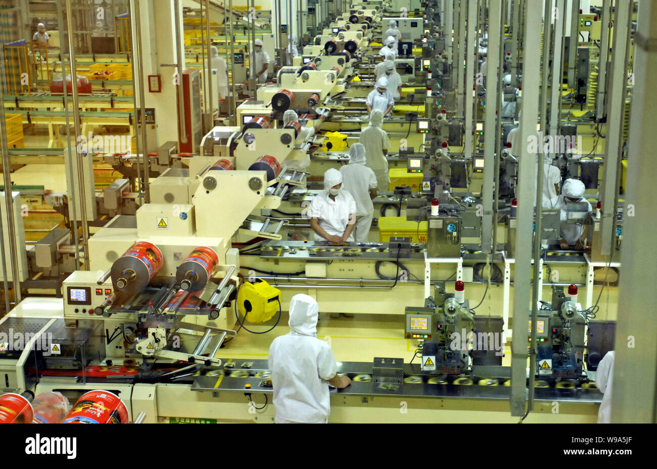 FILEChinese factory workers manufacture Master Kong instant noodle