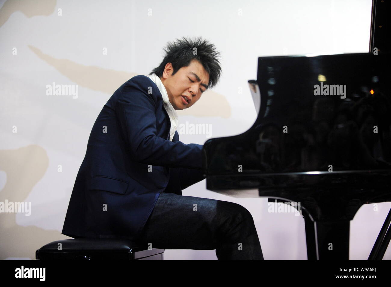Chinese pianist Lang Lang performs during a launching ceremony for his ...