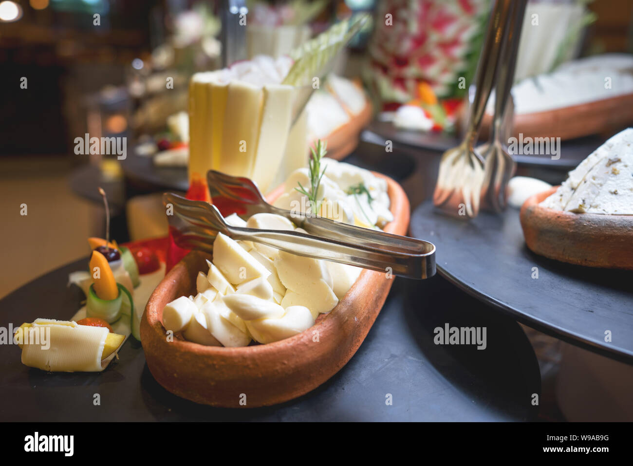 Fresh cheese in clay bowl.Dairy products for breakfast Stock Photo