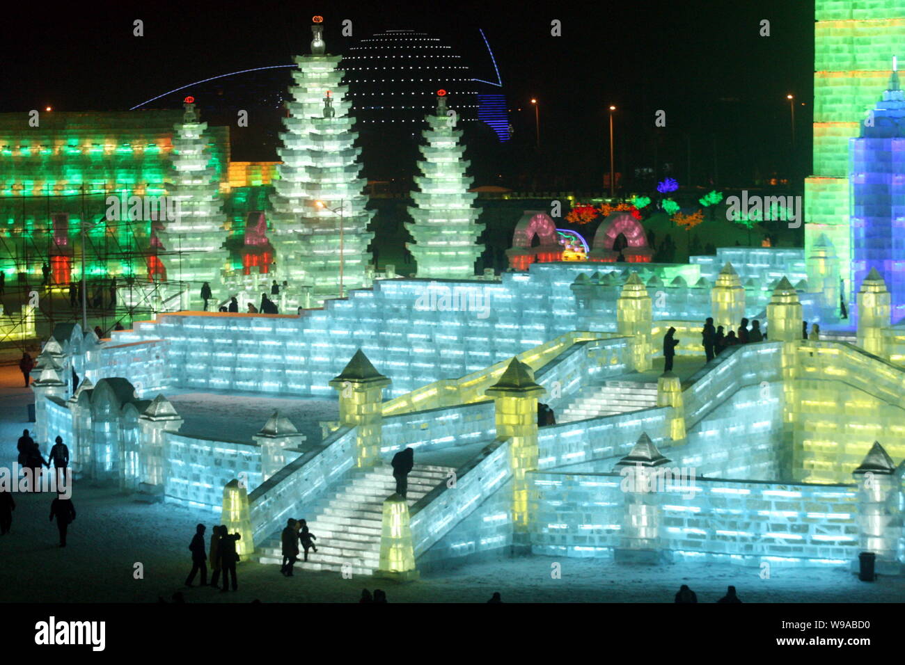 Visitors Look At Ice Sculptures During The Opening Ceremony Of The 26th visitors-look-at-ice-sculptures-during-the-opening-ceremony-of-the-26th