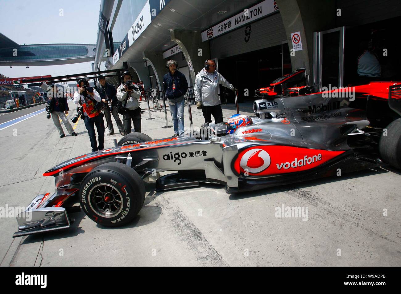 British F1 driver Jenson Button of McLaren Mercedes team is seen in his race car during the free practice session at the Shanghai International Circui Stock Photo