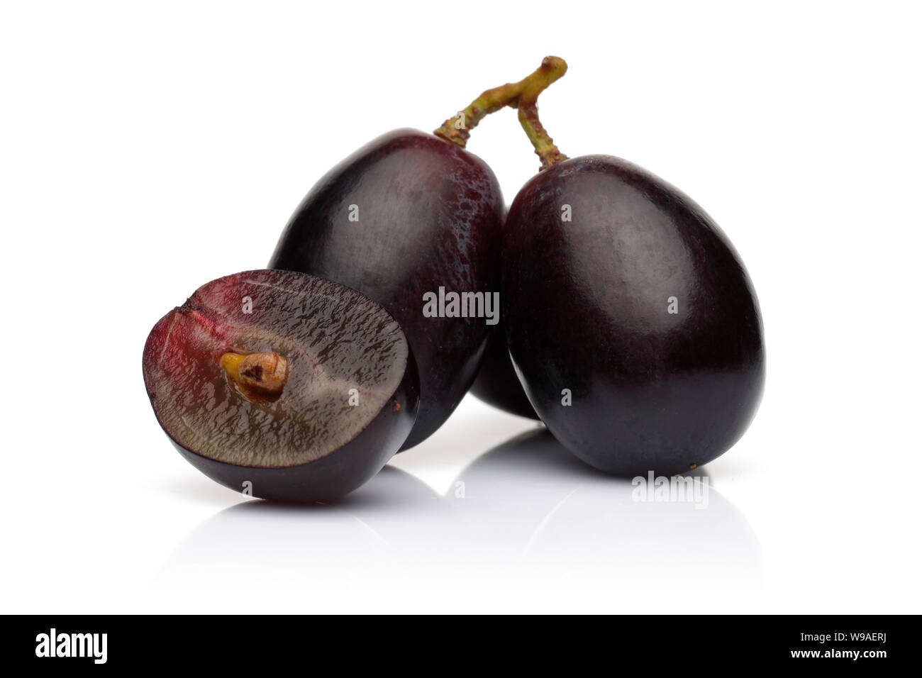 Fresh black grape isolated on white background Stock Photo