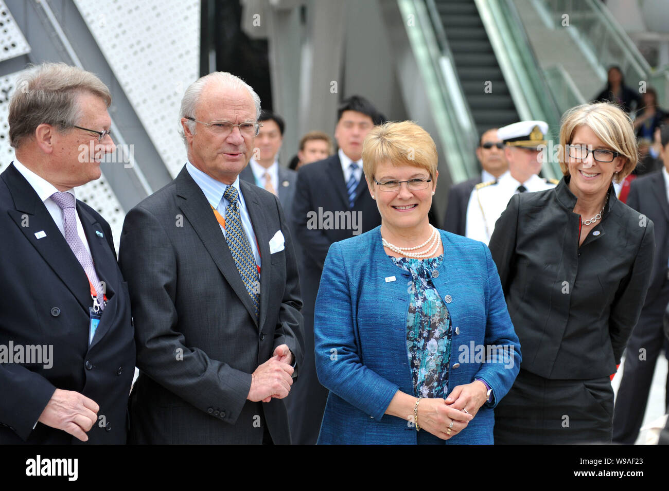 Swedish King Carl XVI Gustaf (L2), Swedish Deputy Prime Minister Maud Olofsson (R2) and followers visit the Sweden Pavilion in the Expo site in Shangh Stock Photo