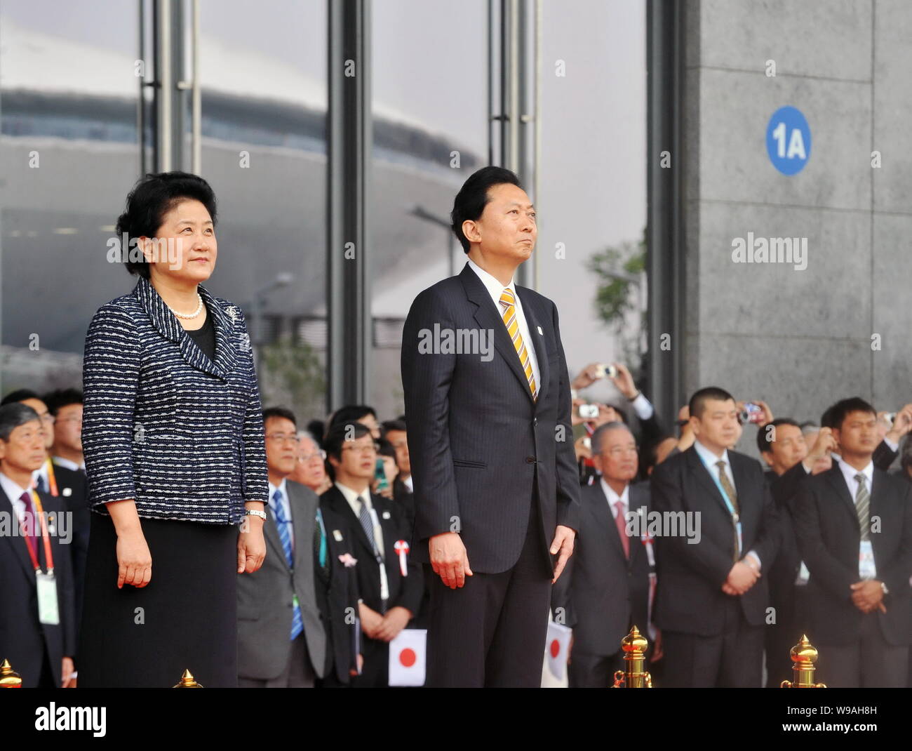 Former Japanese Prime Minister Yukio Hatoyama (R) and Chinese State Councilor Liu Yandong are seen during an event celebrating the Japan Pavilion Day Stock Photo