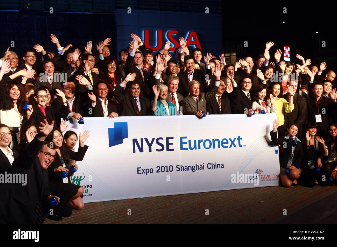 Delegates from NYSE Euronext and NYSE Euronext listed companies are seen during a bell ringing ceremony, to remotely open trading on New York Stock Ex Stock Photo