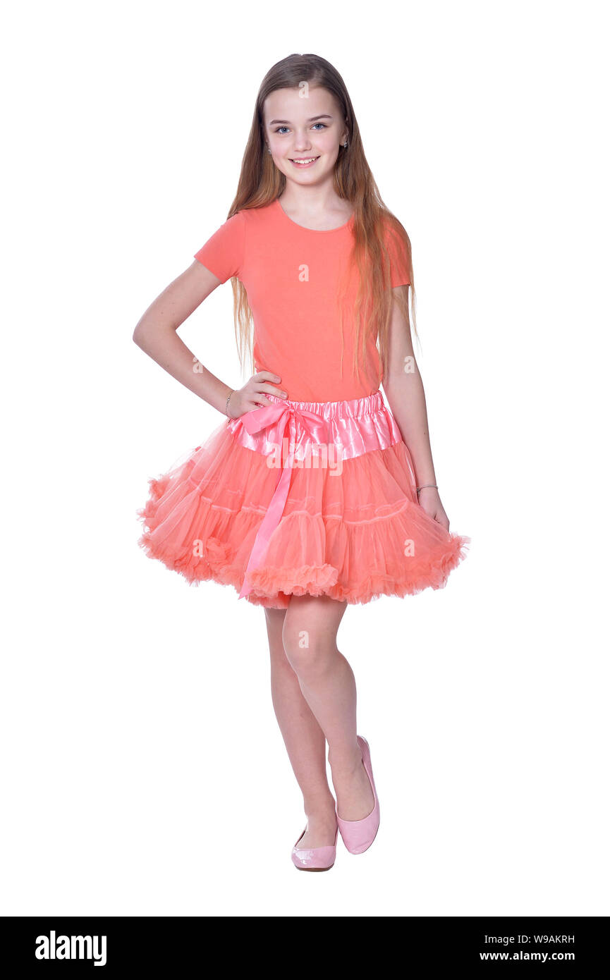 Happy little girl in dress posing on white background Stock Photo - Alamy