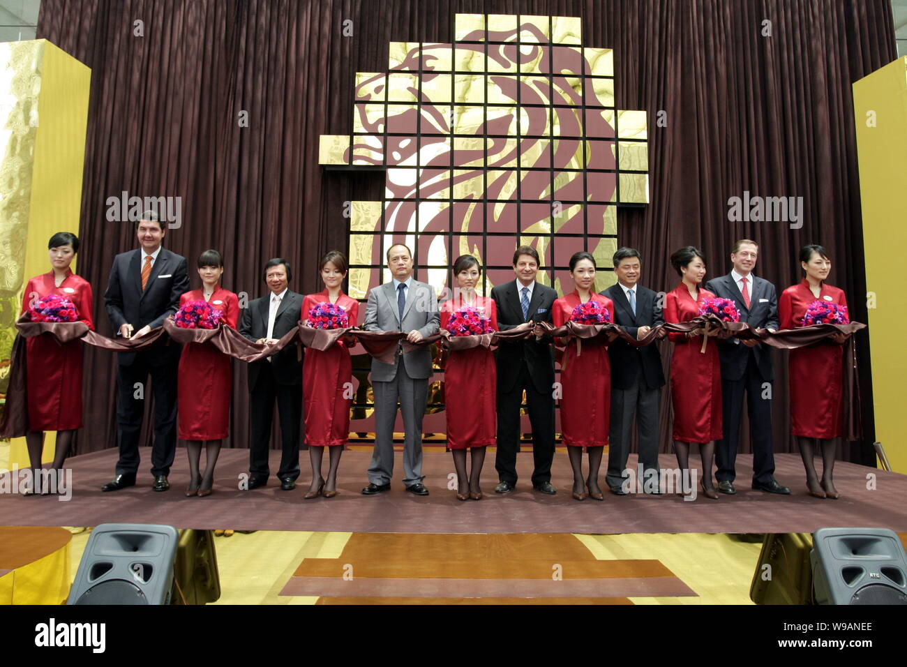 Mark DeCocinis, sixth right, Regional Vice President for Asian Pacific at The Ritz-Carlton Hotel Company, Kwok Ping-Kwong, fourth left, Vice Chairman Stock Photo