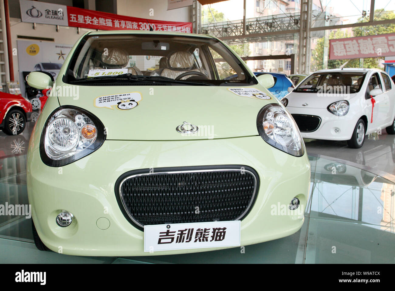 Geely Panda cars are displayed at a Geely dealership in Shanghai, China